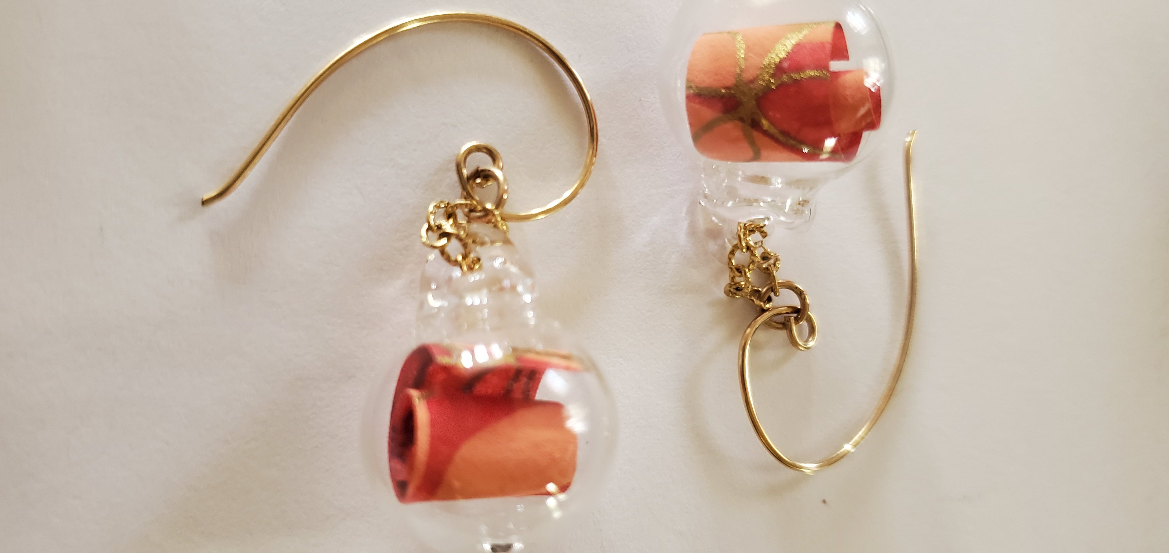 gold and red scrolls earrings
