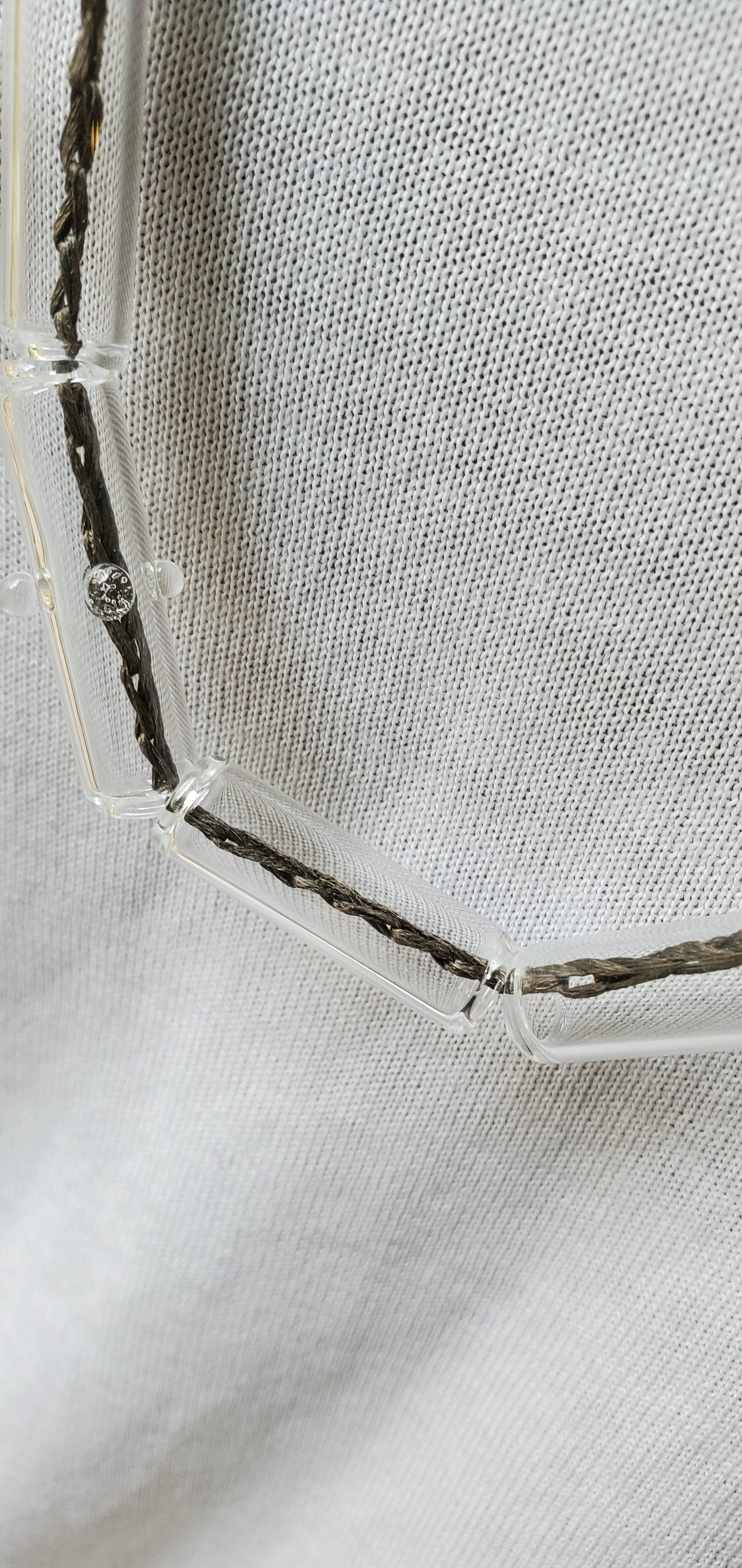single strand dark- coal crocheted with clear pyrex tubes- philadelphia
